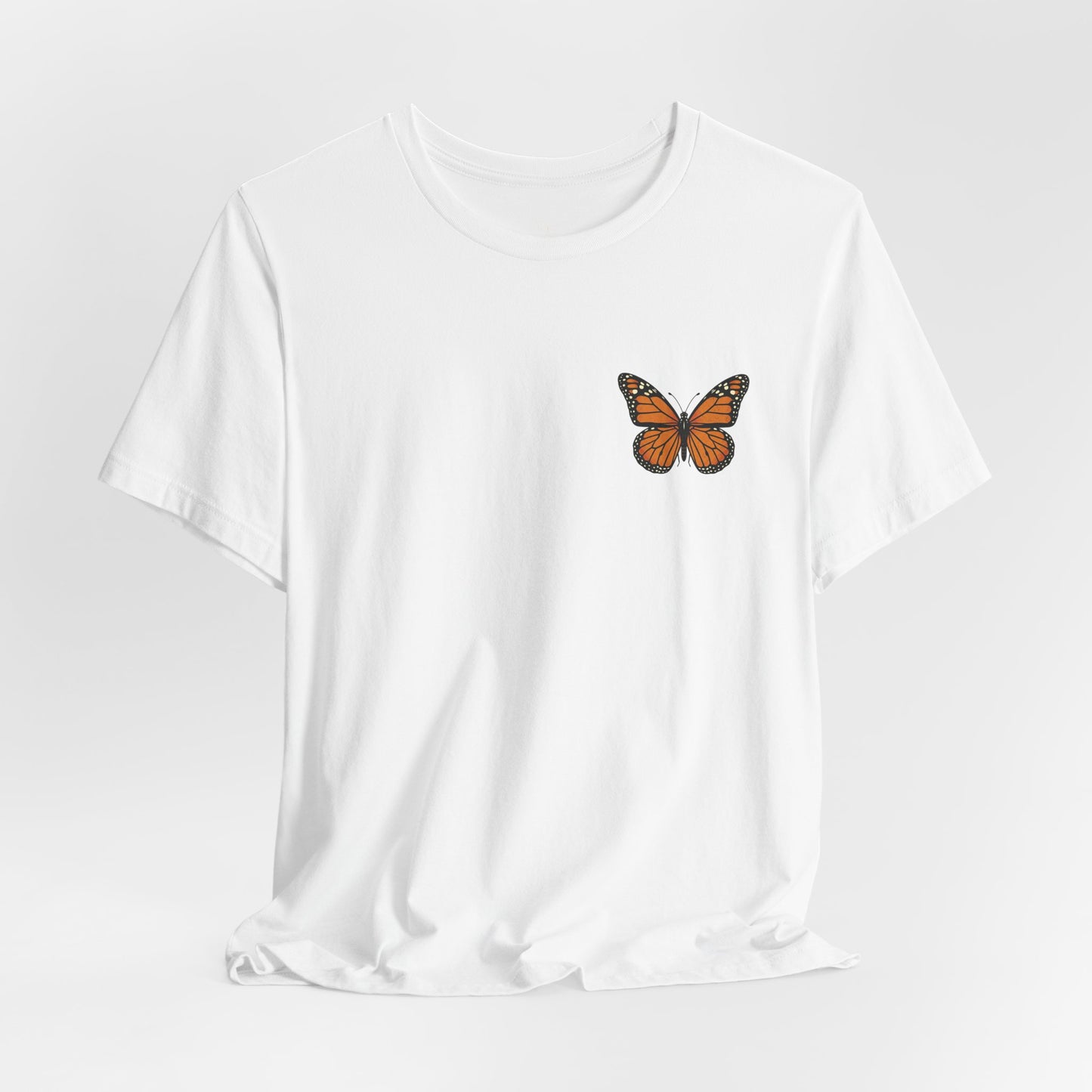 Subtle from the front. Stunning from behind. This Monarch Butterfly Tee