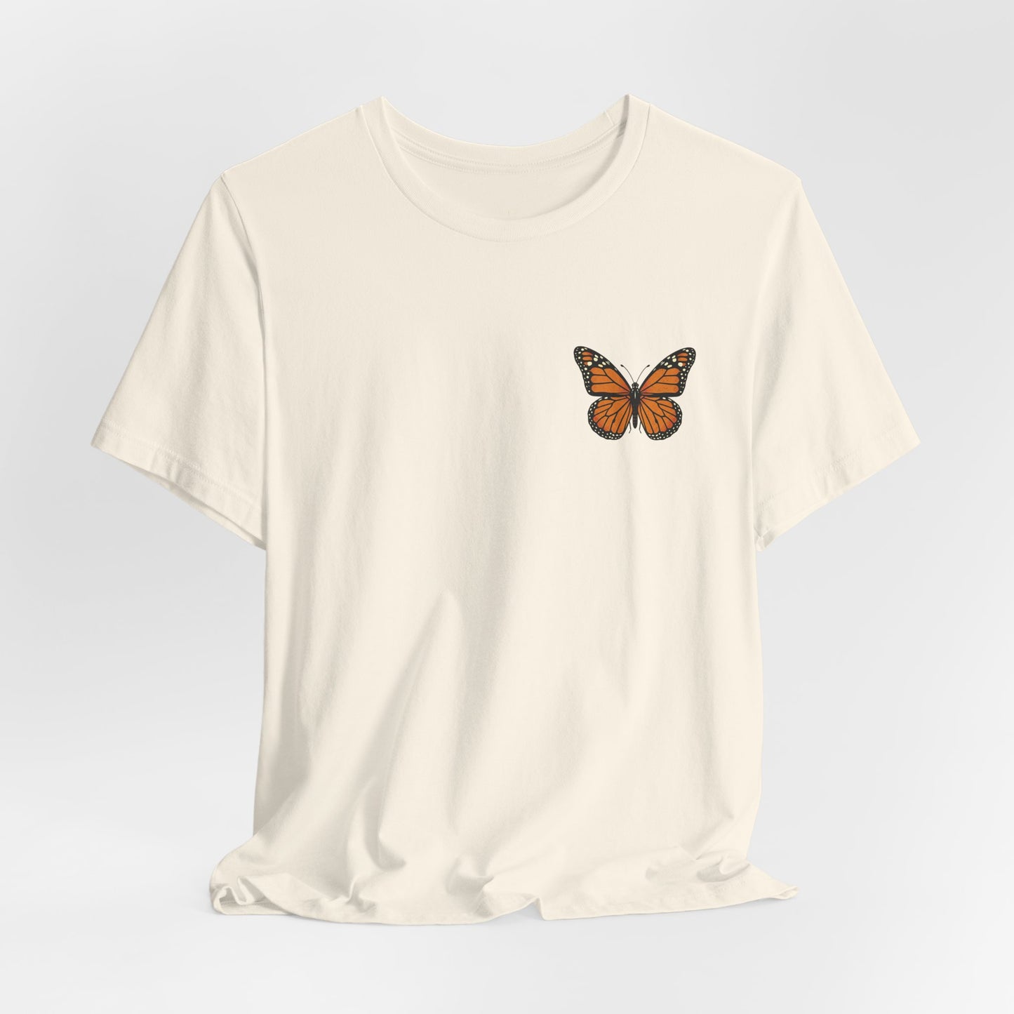 Subtle from the front. Stunning from behind. This Monarch Butterfly Tee